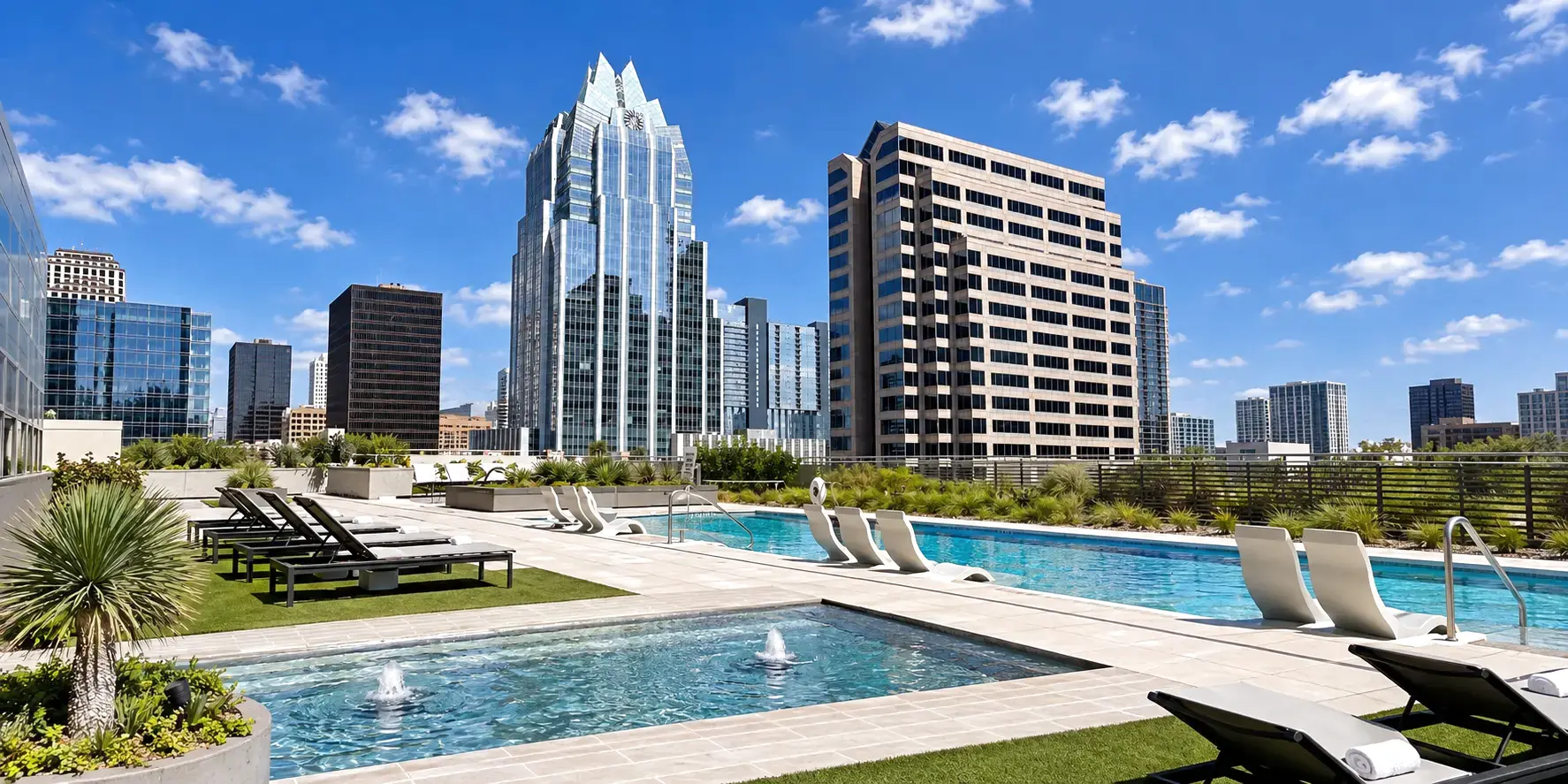 Austin apartment rooftop pool with the Frost Bank Tower in the skyline